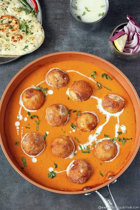Malai kofta in rich gravy